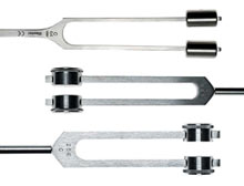 Tuning forks with clamps